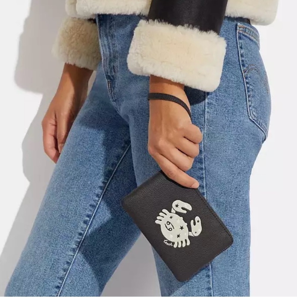 COACH Corner Zip Zodiac crab wristlet for July birthdays